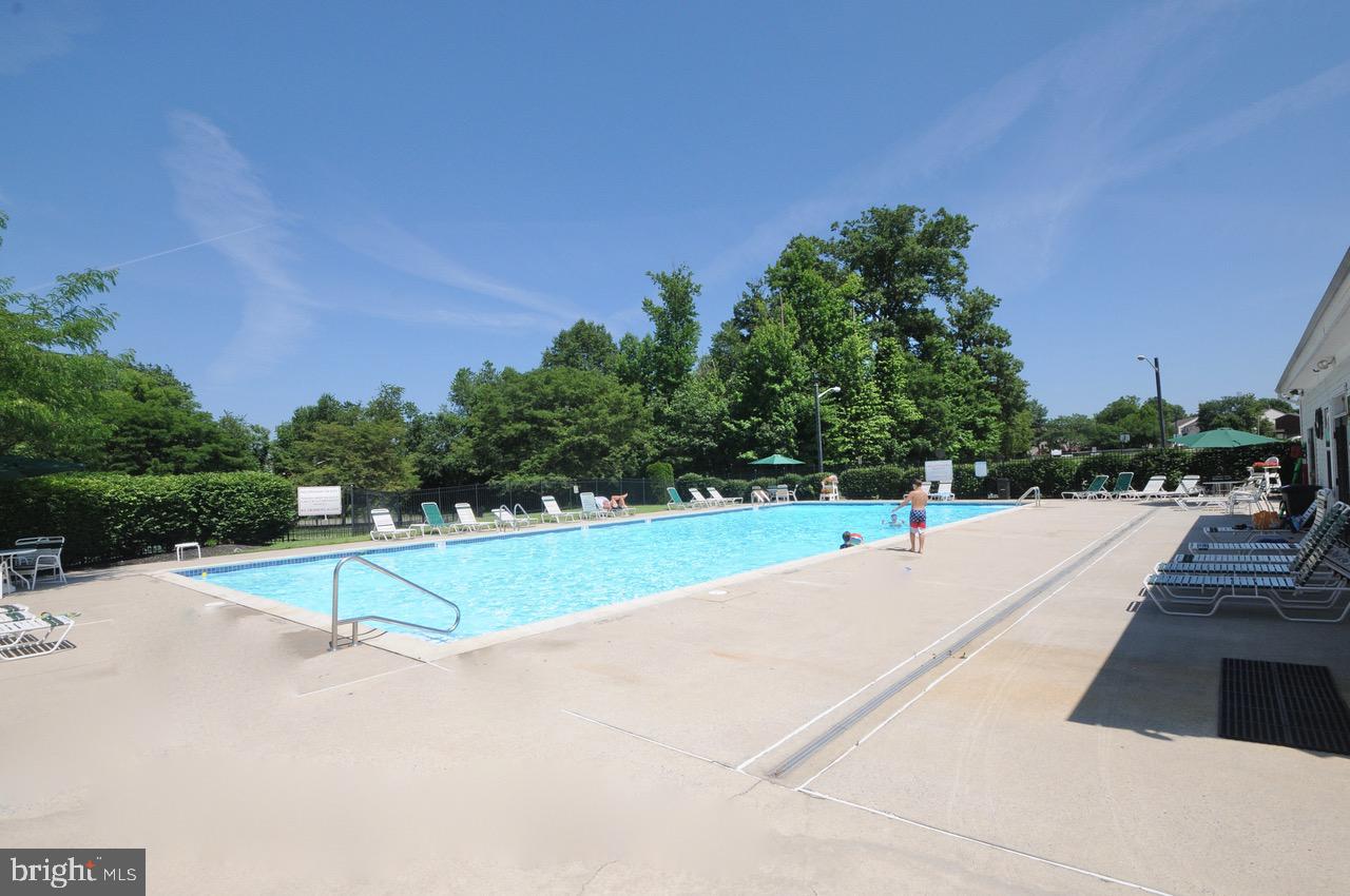 349 Huntington Drive Delran, NJ 08075 - Photo 59 of 68 a view of a park with large trees and a street