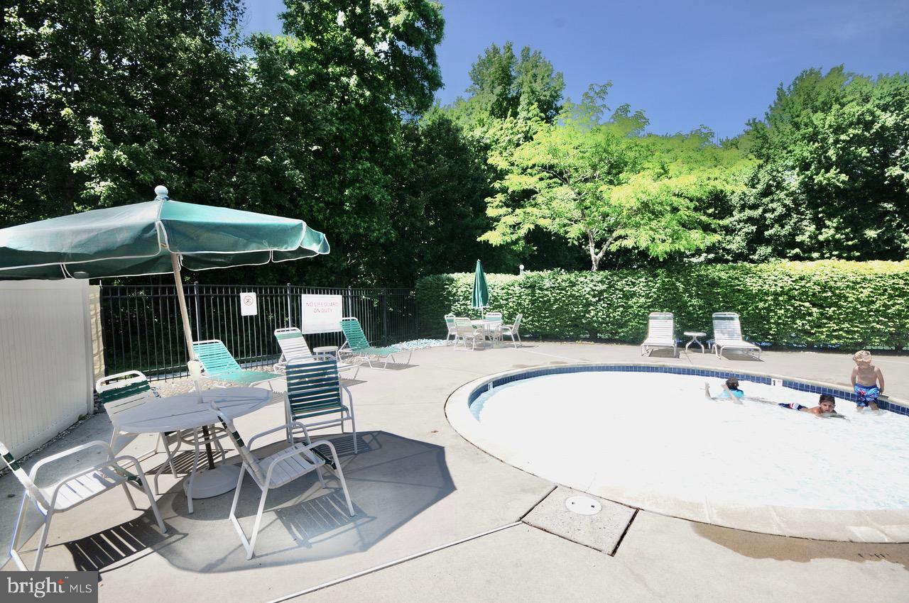349 Huntington Drive Delran, NJ 08075 - Photo 60 of 68 a swimming pool with outdoor seating yard and green space