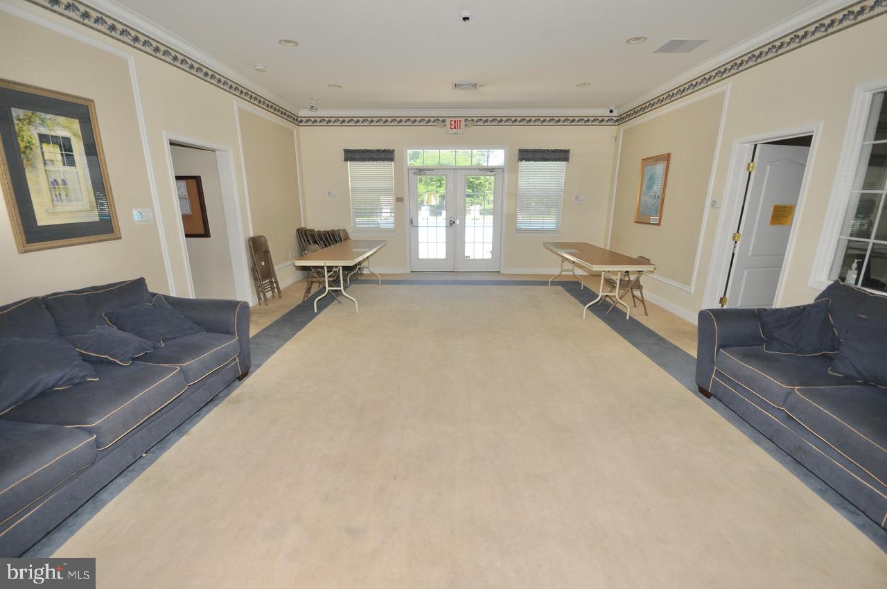 349 Huntington Drive Delran, NJ 08075 - Photo 63 of 68 a living room with furniture and a large window