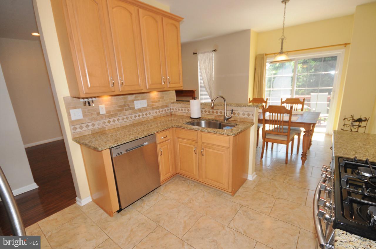 349 Huntington Drive Delran, NJ 08075 - Photo 9 of 68 a kitchen with a sink and cabinets