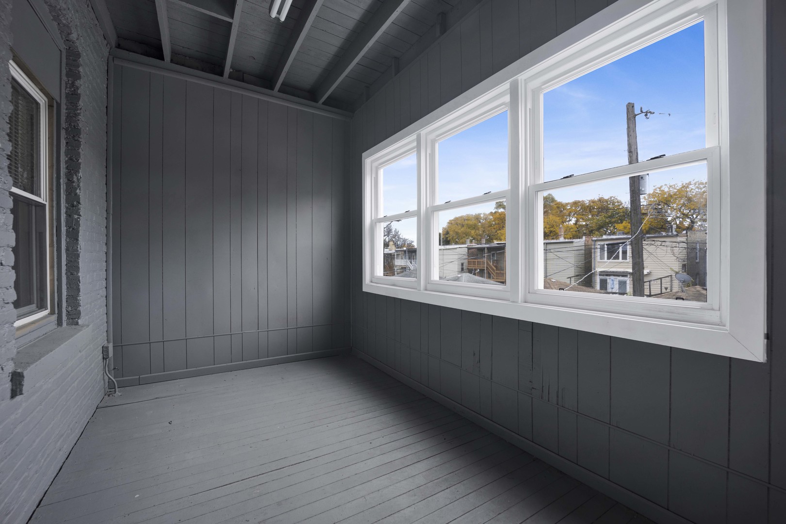 5015 West Montrose Avenue, Unit 2 Chicago, IL 60641 - Photo 19 of 23 a view of an empty room with a window