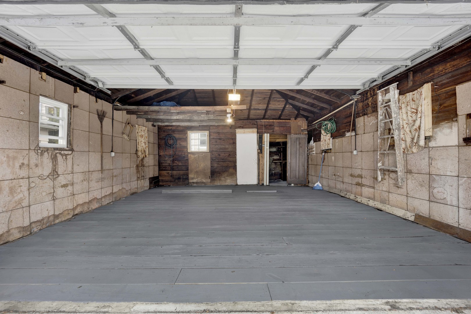 5015 West Montrose Avenue, Unit 2 Chicago, IL 60641 - Photo 20 of 23 a view of empty room with wooden ceiling fan