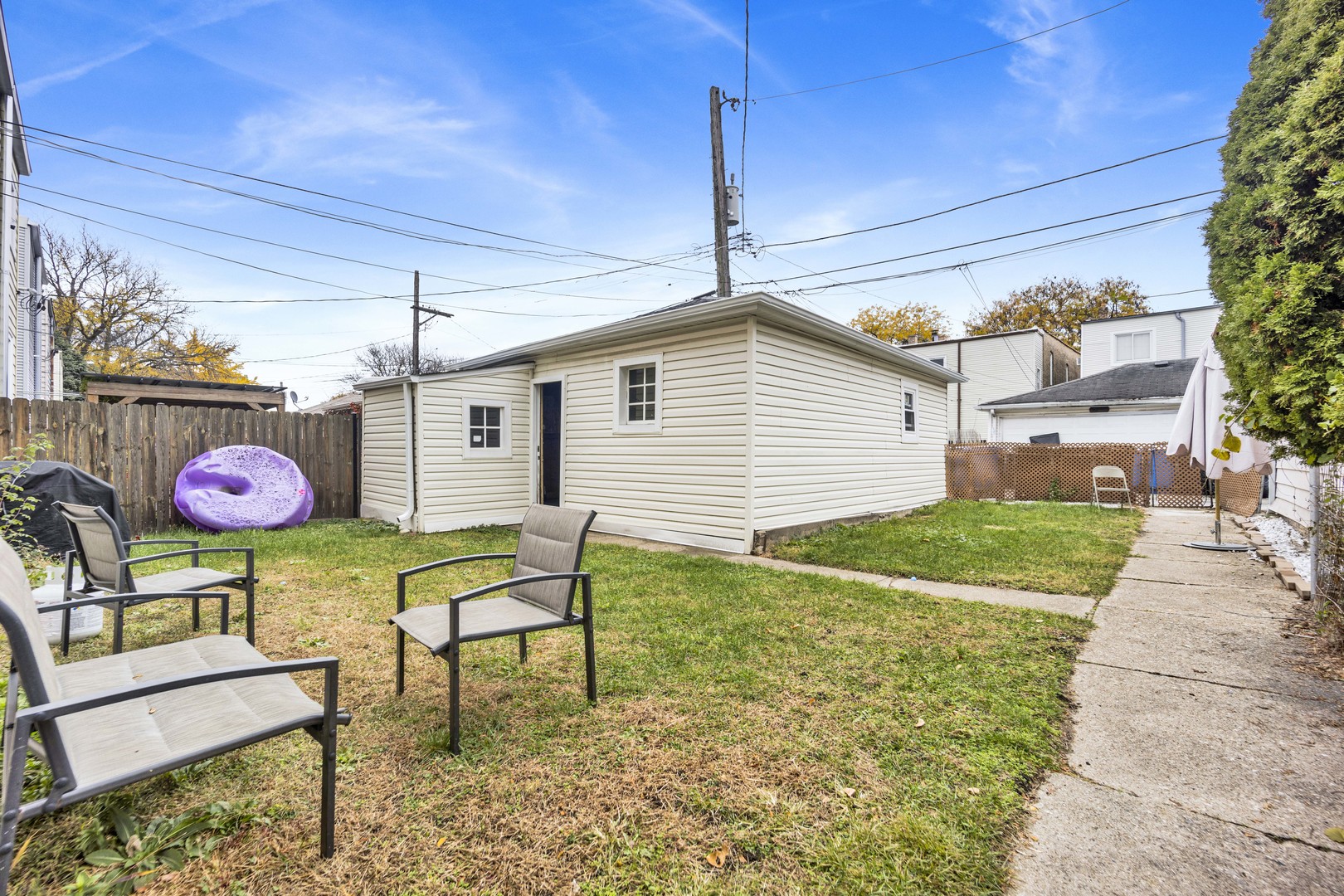 5015 West Montrose Avenue, Unit 2 Chicago, IL 60641 - Photo 2 of 23 a view of a chairs and table in a patio