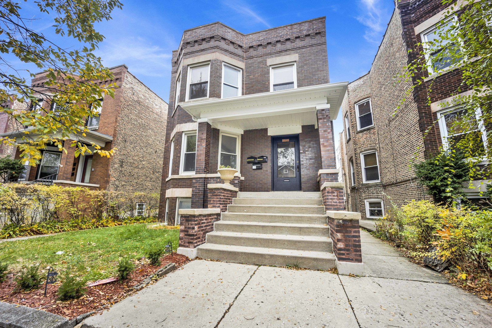 5015 West Montrose Avenue, Unit 2 Chicago, IL 60641 - Photo 22 of 23 a front view of a house