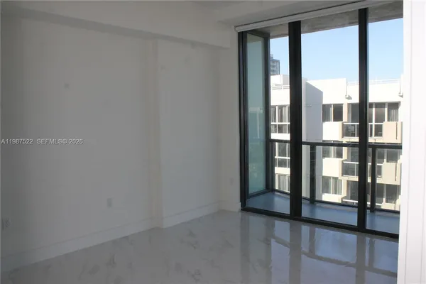 a view of balcony and yard