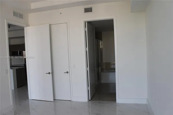 a view of a city with tall buildings