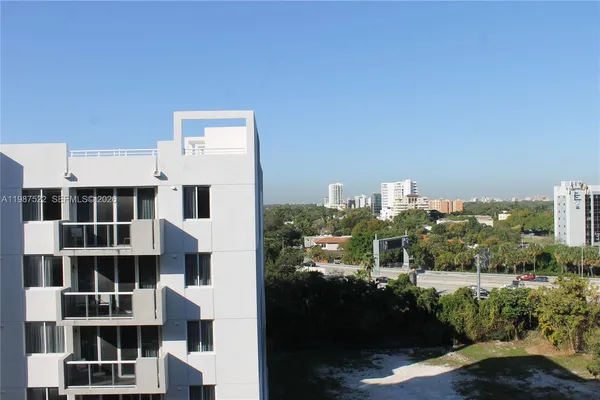 a view of a city with tall buildings