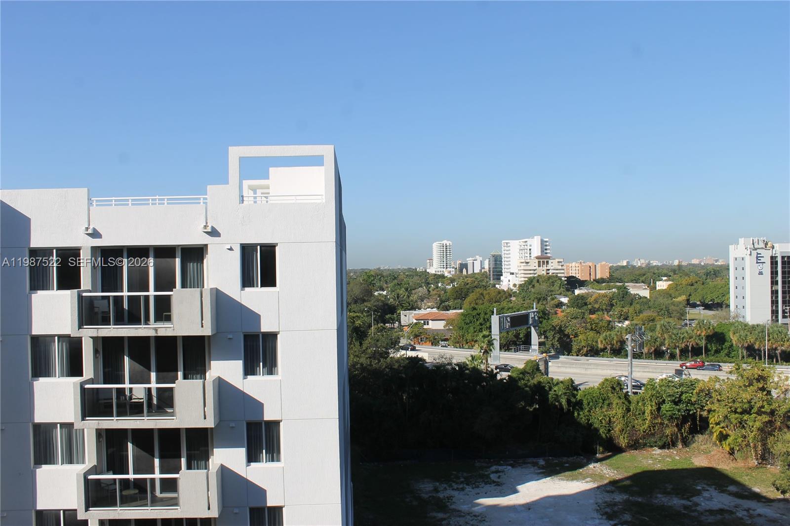 201 Southwest 17th Road, Unit 802 Miami, FL 33129 - Photo 18 of 20 a view of a city with tall buildings