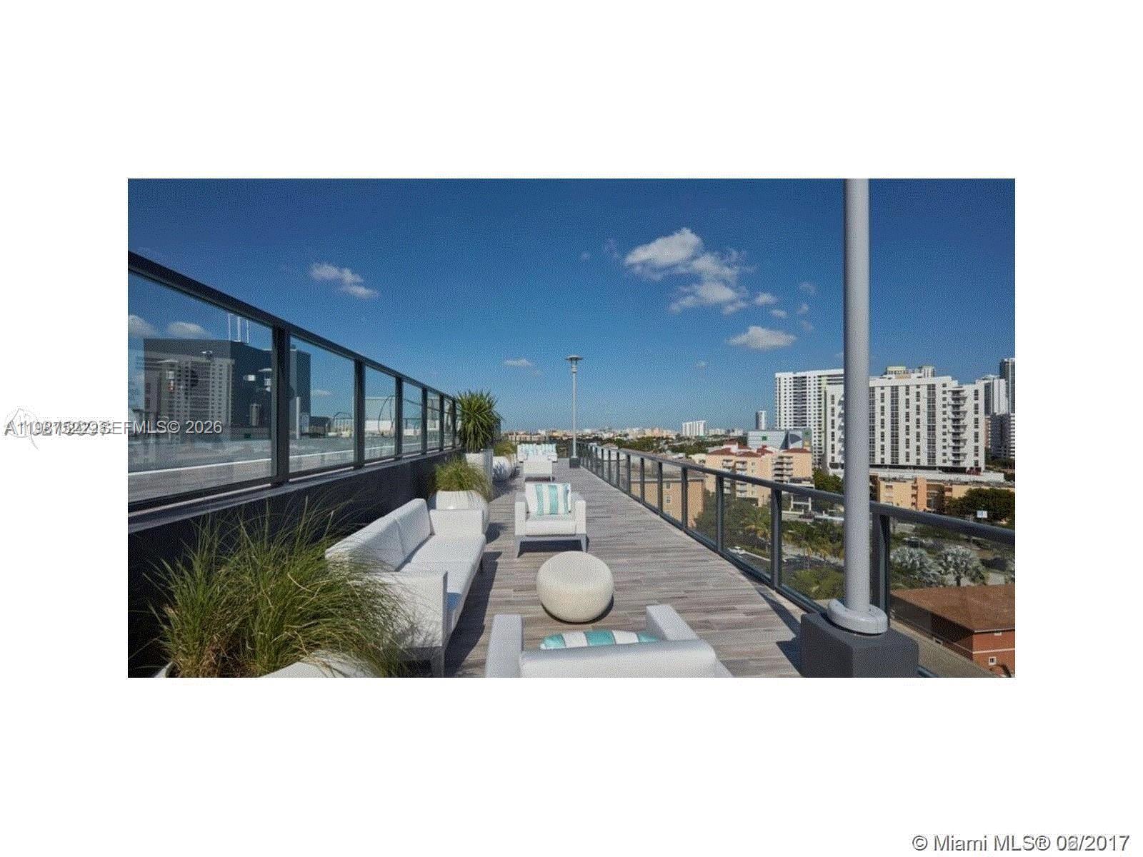 201 Southwest 17th Road, Unit 802 Miami, FL 33129 - Photo 2 of 20 a view interior of house and livingroom with furniture