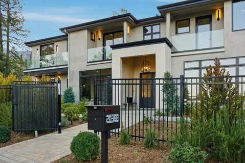 a house view with a garden space