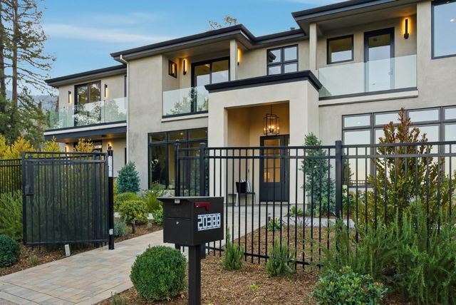 a house view with a garden space