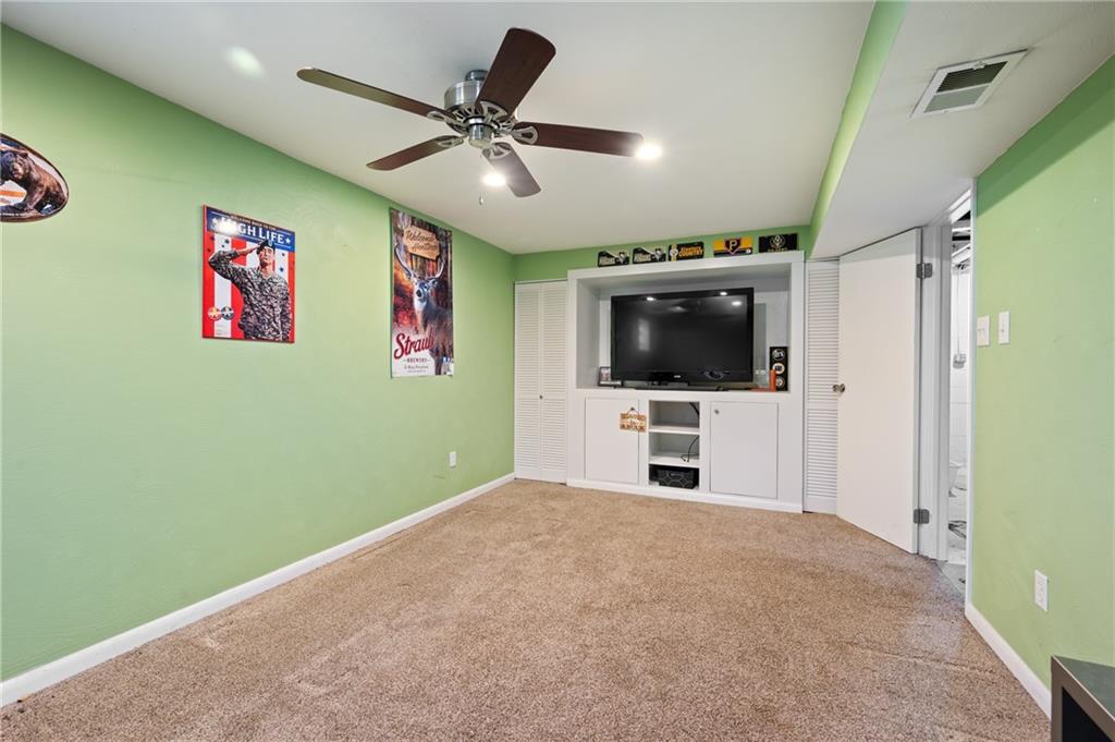 201 Cameron Drive Irwin, PA 15642 - Photo 23 of 30 a view of a livingroom with a flat screen tv