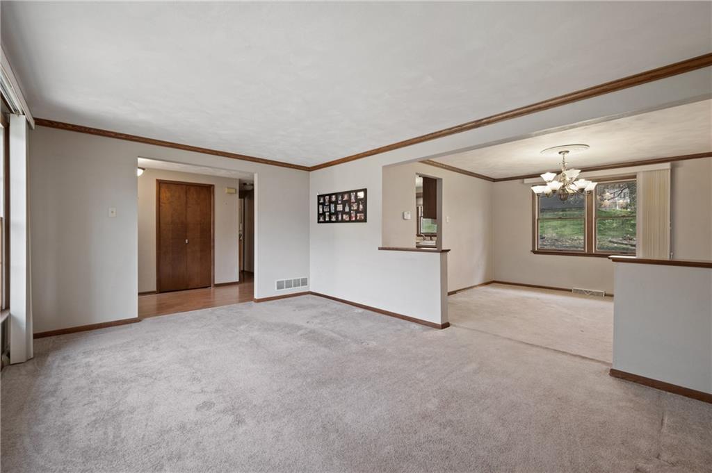 201 Cameron Drive Irwin, PA 15642 - Photo 6 of 30 an empty room with windows and closet