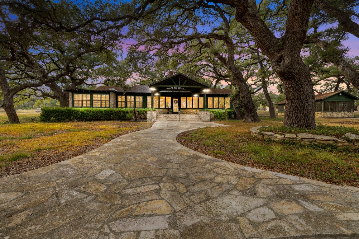 315 Flying R Ranch Road Spring Branch, TX 78070 - Photo 2 of 39 View of front of property featuring stone siding