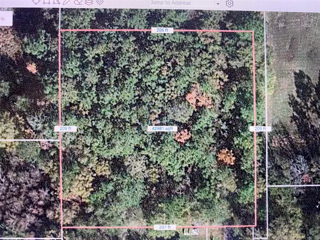 a view of a backyard of the house