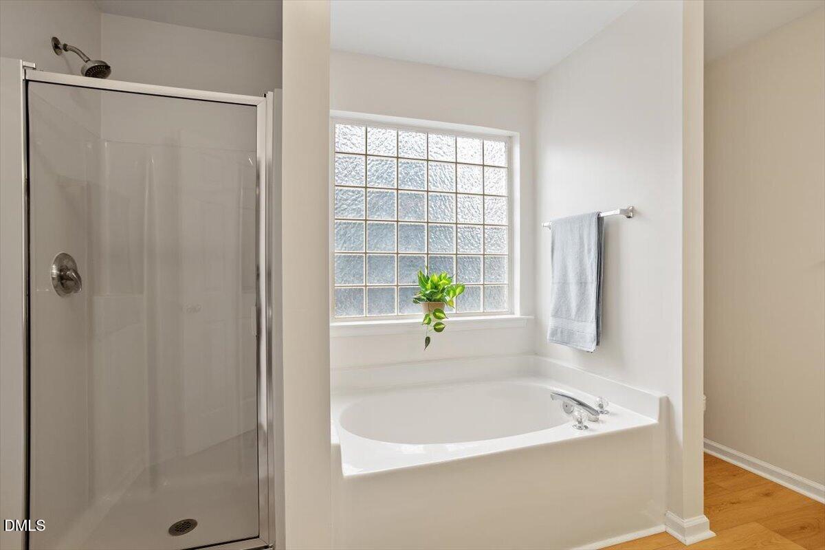 8300 Eel Court Raleigh, NC 27616 - Photo 20 of 36 Separate Shower and Tub in Primary En Suite