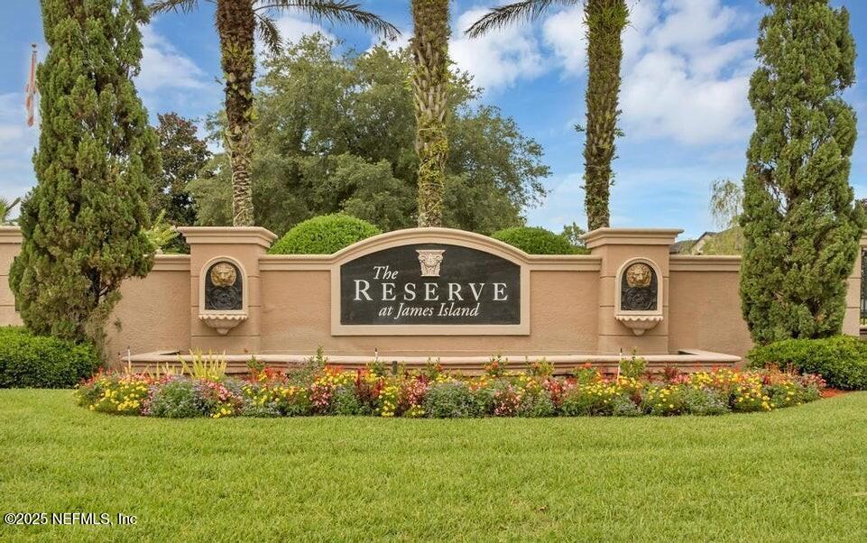 10961 Burnt Mill Road, Unit 328 Jacksonville, FL 32256 - Photo 26 of 33 a blue house with garden in front of it