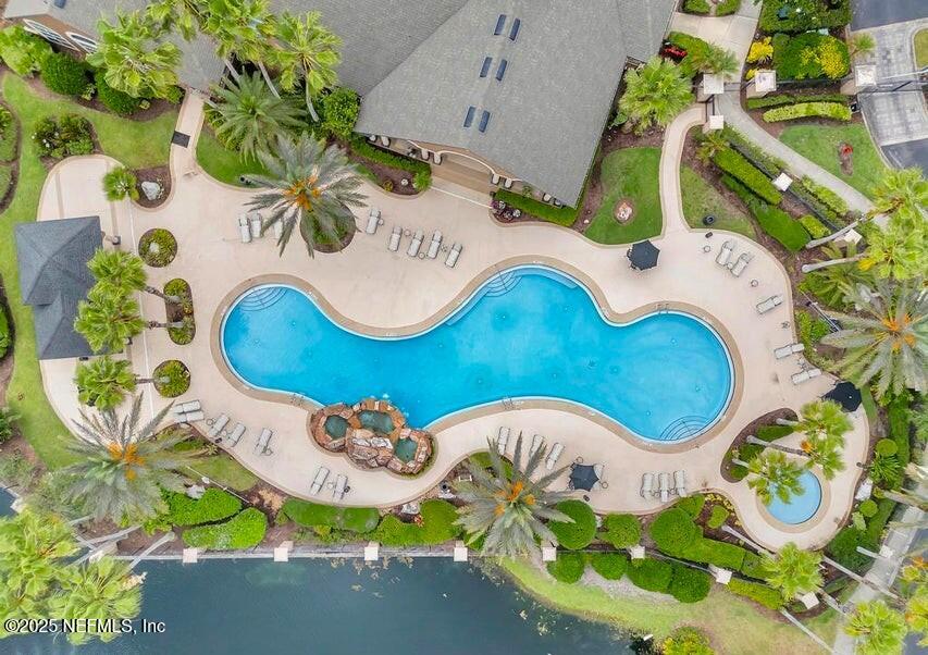 10961 Burnt Mill Road, Unit 328 Jacksonville, FL 32256 - Photo 33 of 33 a bathroom with a sink and mirror