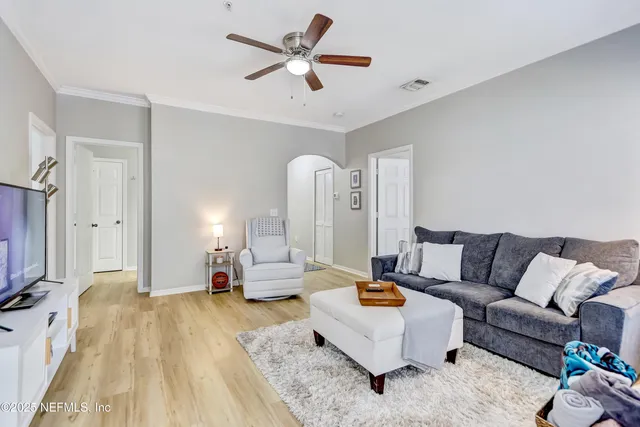 a living room with furniture and a couch