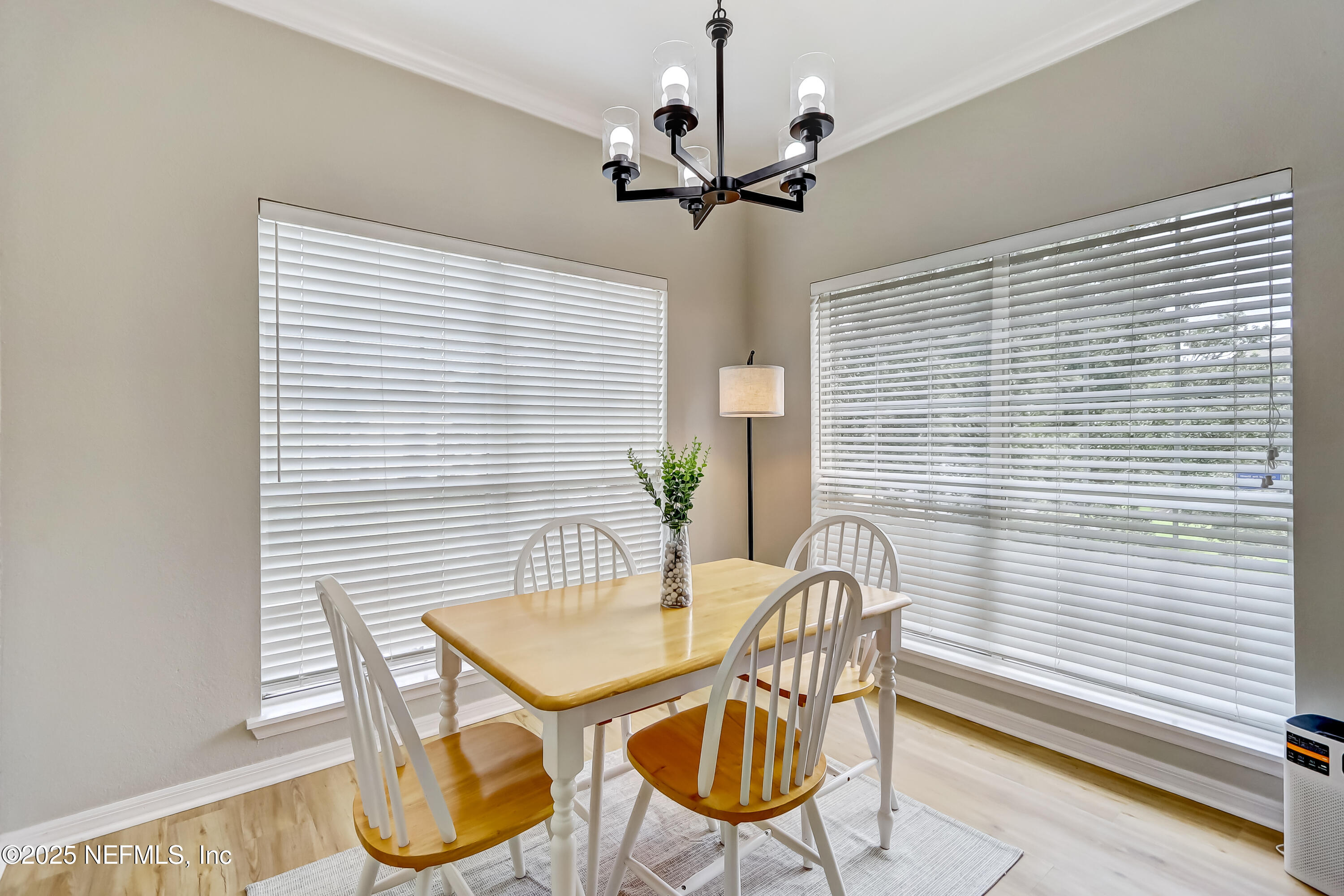 10961 Burnt Mill Road, Unit 328 Jacksonville, FL 32256 - Photo 10 of 33 a dining room with furniture and window