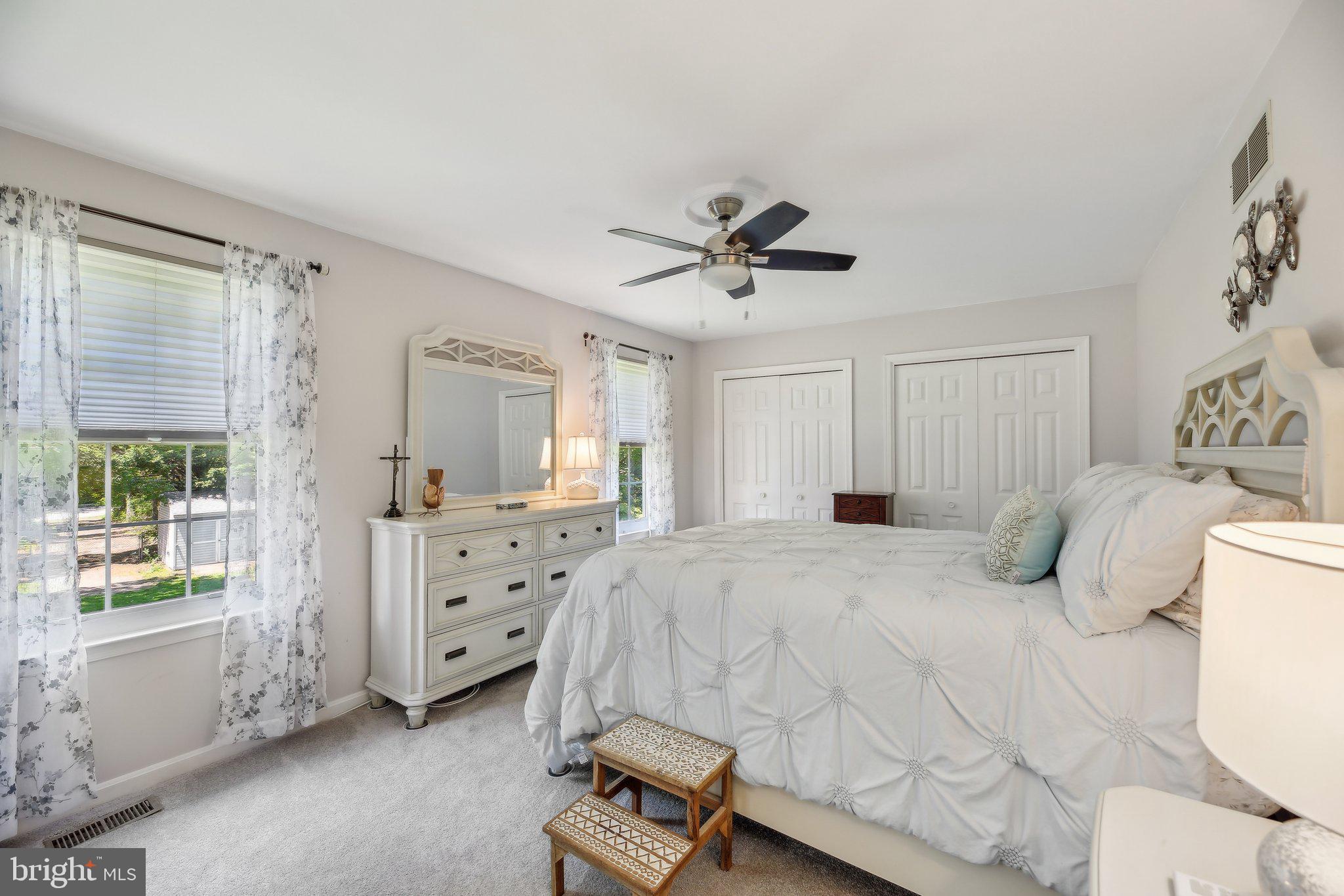 9202 Stone Spring Lane Pasadena, MD 21122 - Photo 23 of 43 a bed room with a bed and a window