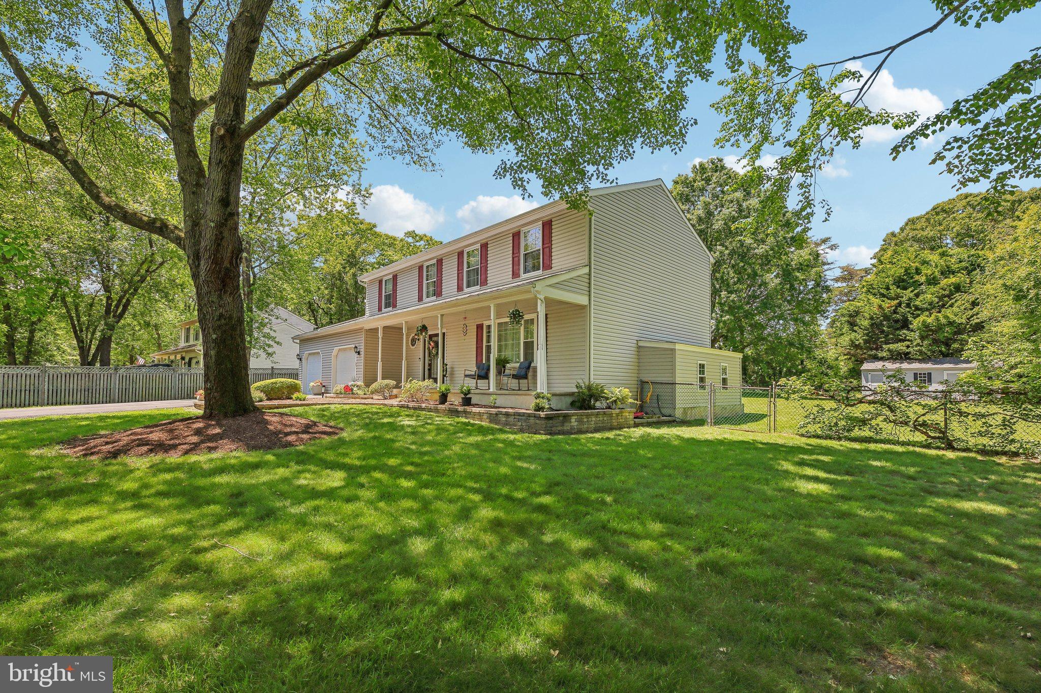 9202 Stone Spring Lane Pasadena, MD 21122 - Photo 4 of 43 a view of a house with backyard and sitting area