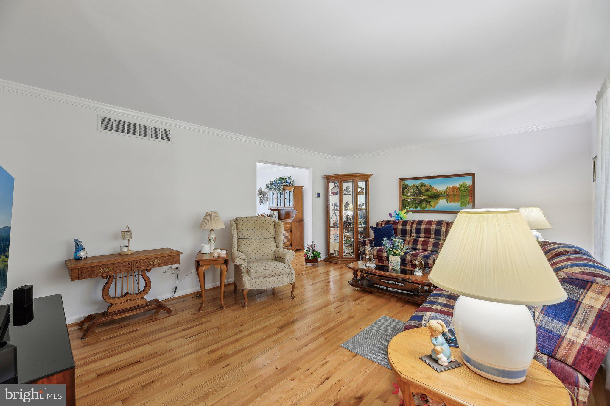 9202 Stone Spring Lane Pasadena, MD 21122 - Photo 9 of 43 a living room with furniture