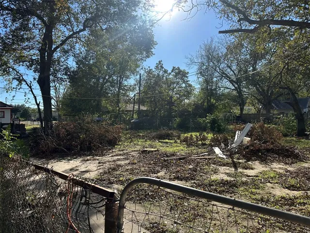 a view of a backyard of the house