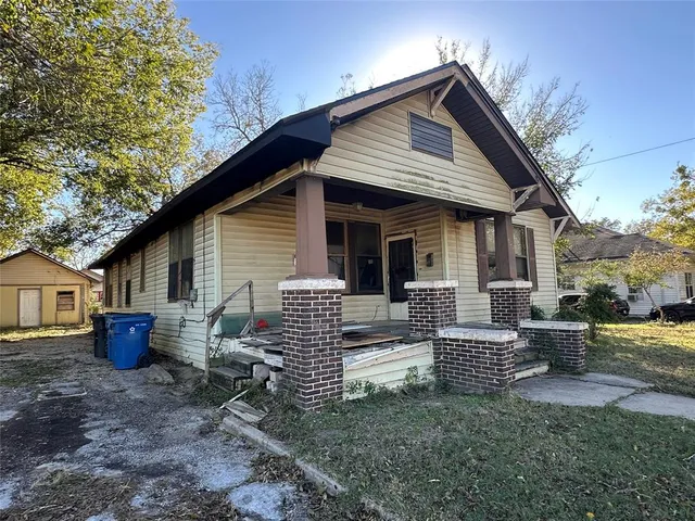a view of house with a patio
