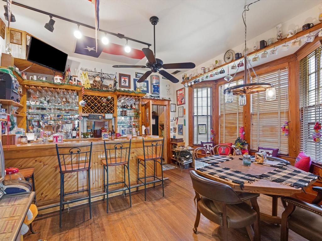 111 Munns Powell, TX 75153 - Photo 20 of 39 a view of a dining room with furniture window and wooden floor