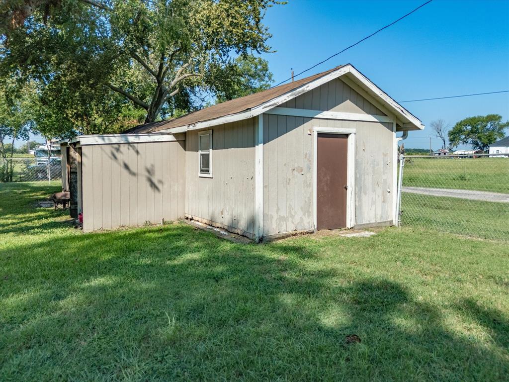 111 Munns Powell, TX 75153 - Photo 27 of 39 a front view of house with yard and green space