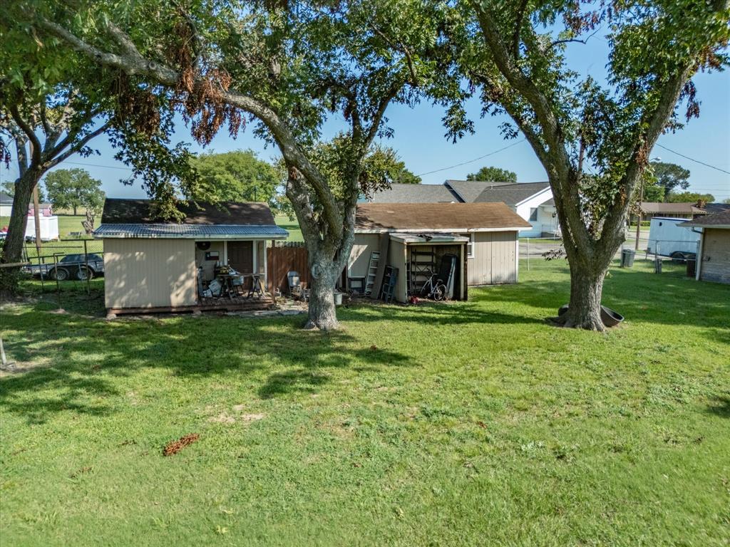 111 Munns Powell, TX 75153 - Photo 29 of 39 a front view of a house with a yard