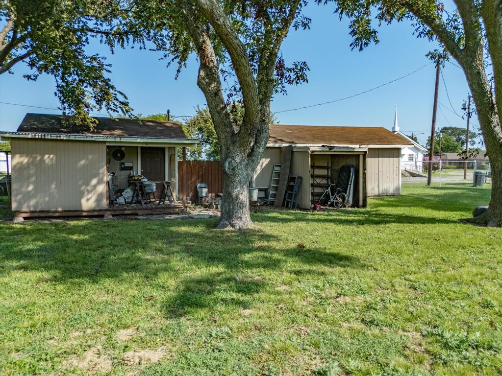 111 Munns Powell, TX 75153 - Photo 30 of 39 a front view of a house with garden