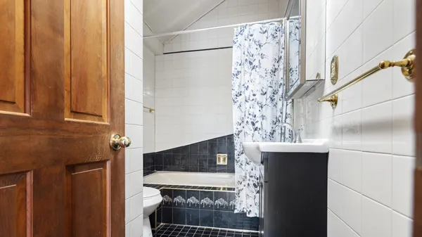 a view of balcony with wooden floor