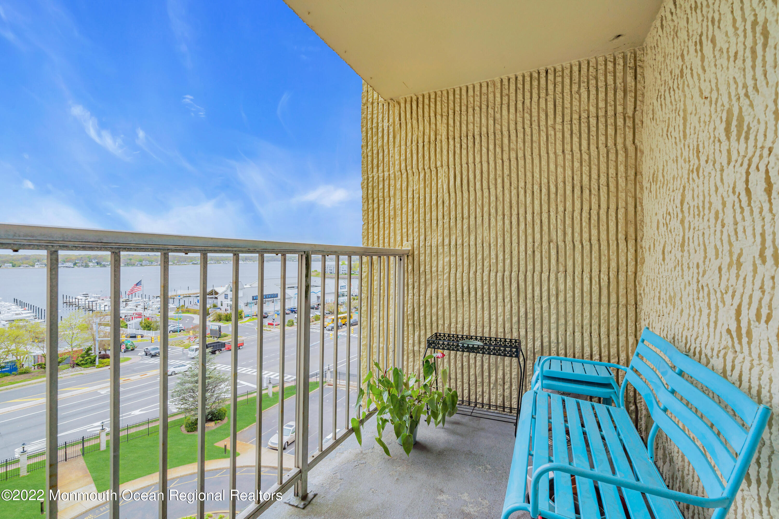 1000 River Road, Unit 7B Belmar, NJ 07719 - Photo 13 of 38 a view of a porch with a floor to ceiling window