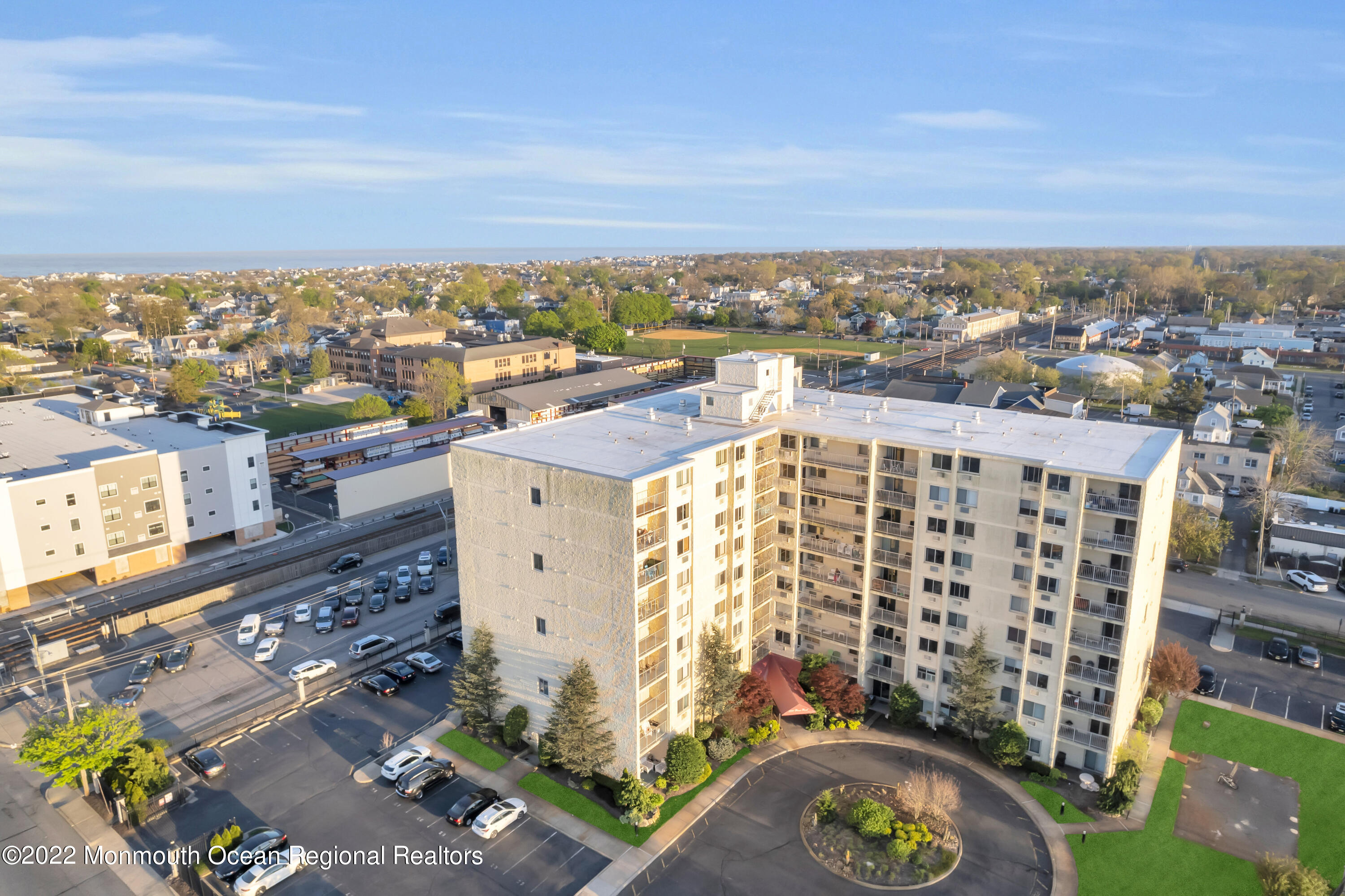 1000 River Road, Unit 7B Belmar, NJ 07719 - Photo 23 of 38 an aerial view of a building
