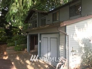 10939 Southeast 183rd Court Renton, WA 98055 - Photo 3 of 28 a front view of a house with a yard