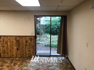 10939 Southeast 183rd Court Renton, WA 98055 - Photo 6 of 28 a view of a room with large window