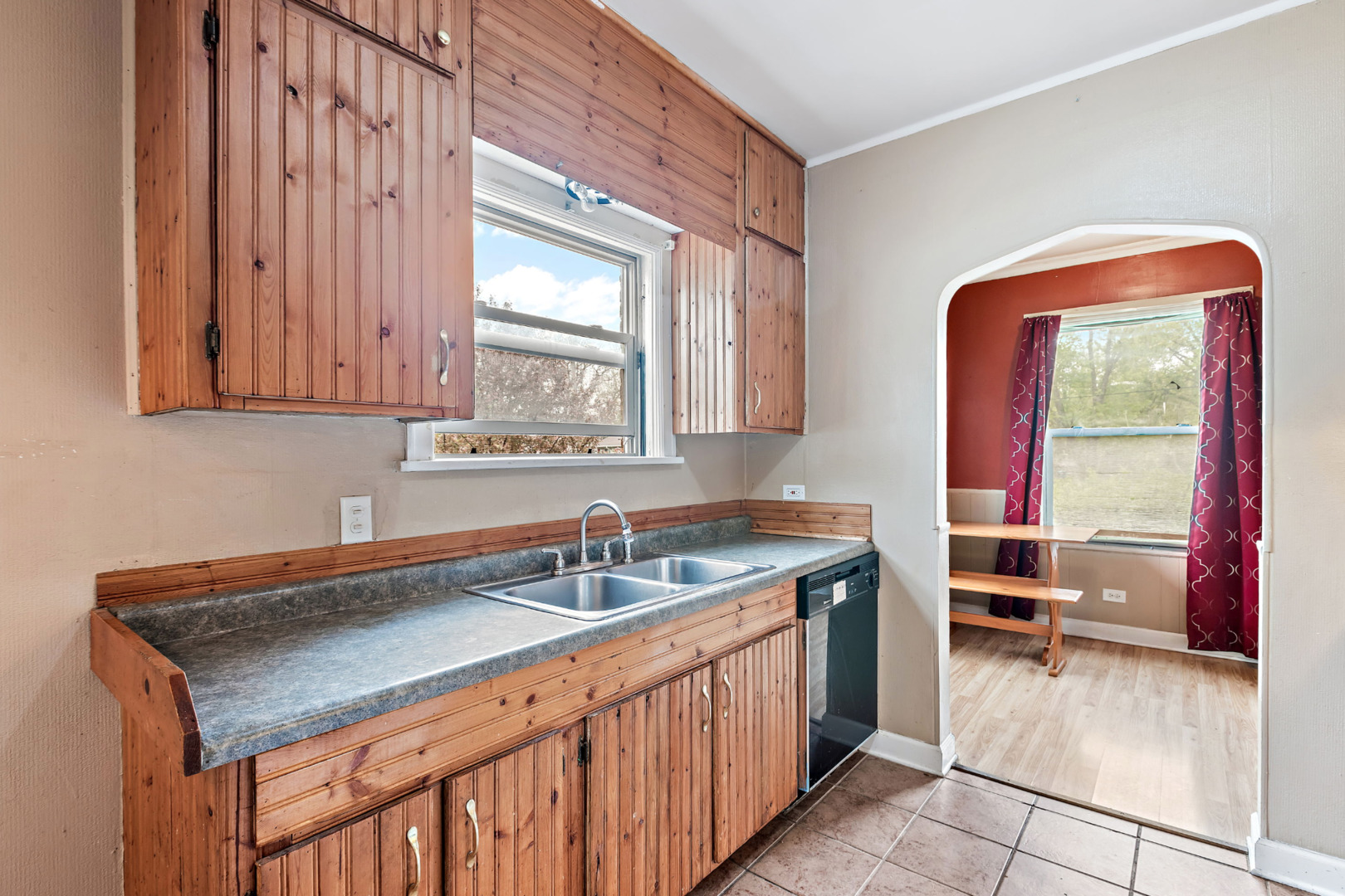 389 West 12th Street Chicago Heights, IL 60411 - Photo 8 of 15 a utility room with a sink a mirror and a window