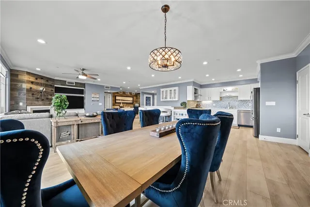 a kitchen with white cabinets and appliances