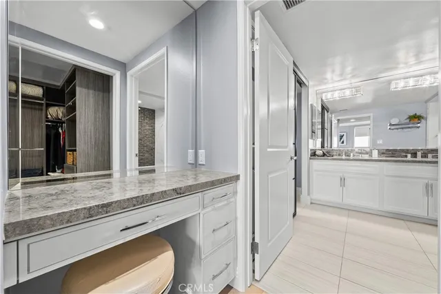 a spacious bathroom with a shower a mirror and a bathtub