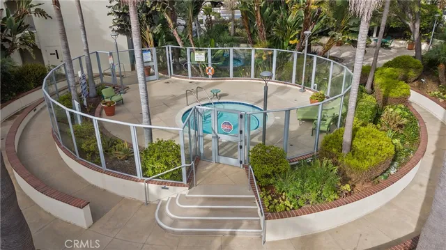 an aerial view of residential building with parking space