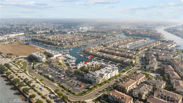 an aerial view of a city with lots of residential buildings