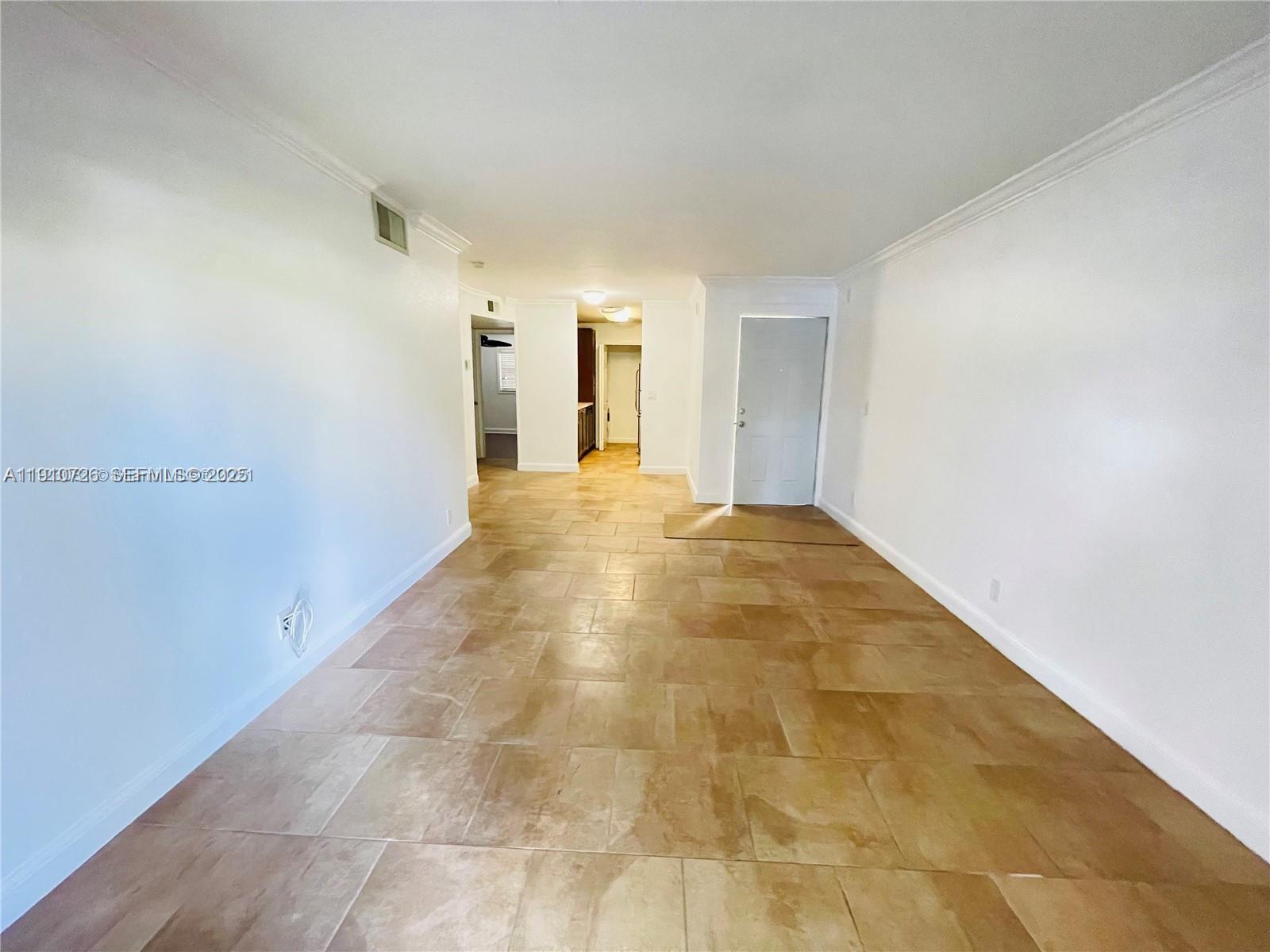4086 North Pine Island Road, Unit 508 Sunrise, FL 33351 - Photo 7 of 13 a view of a big room with closet and windows