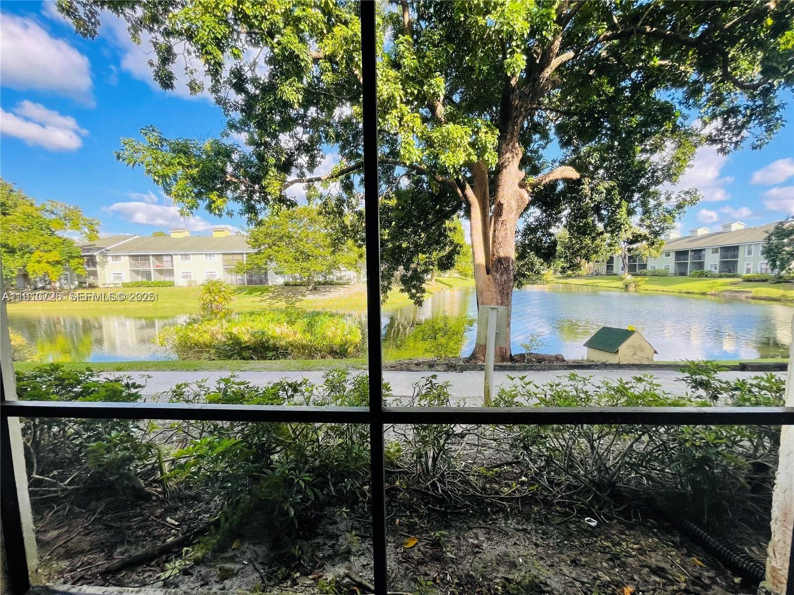 4086 North Pine Island Road, Unit 508 Sunrise, FL 33351 - Photo 8 of 13 a view of a garden from a balcony