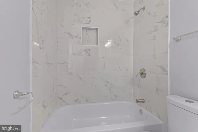 a bathroom with a bathtub