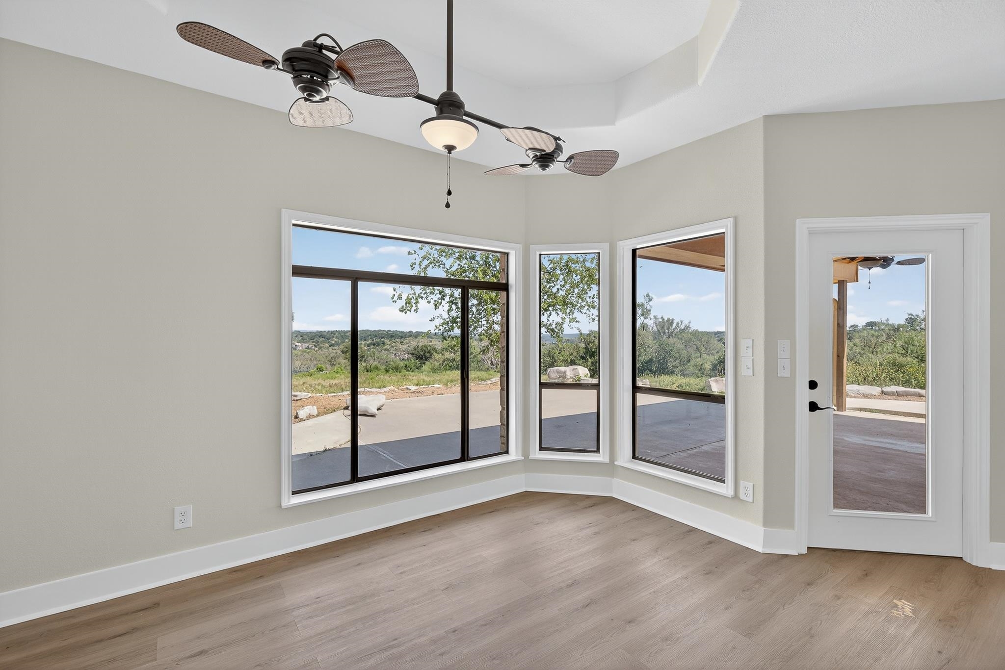 95 Gateway North Marble Falls, TX 78654 - Photo 11 of 30 a view of an empty room with a window and wooden floor