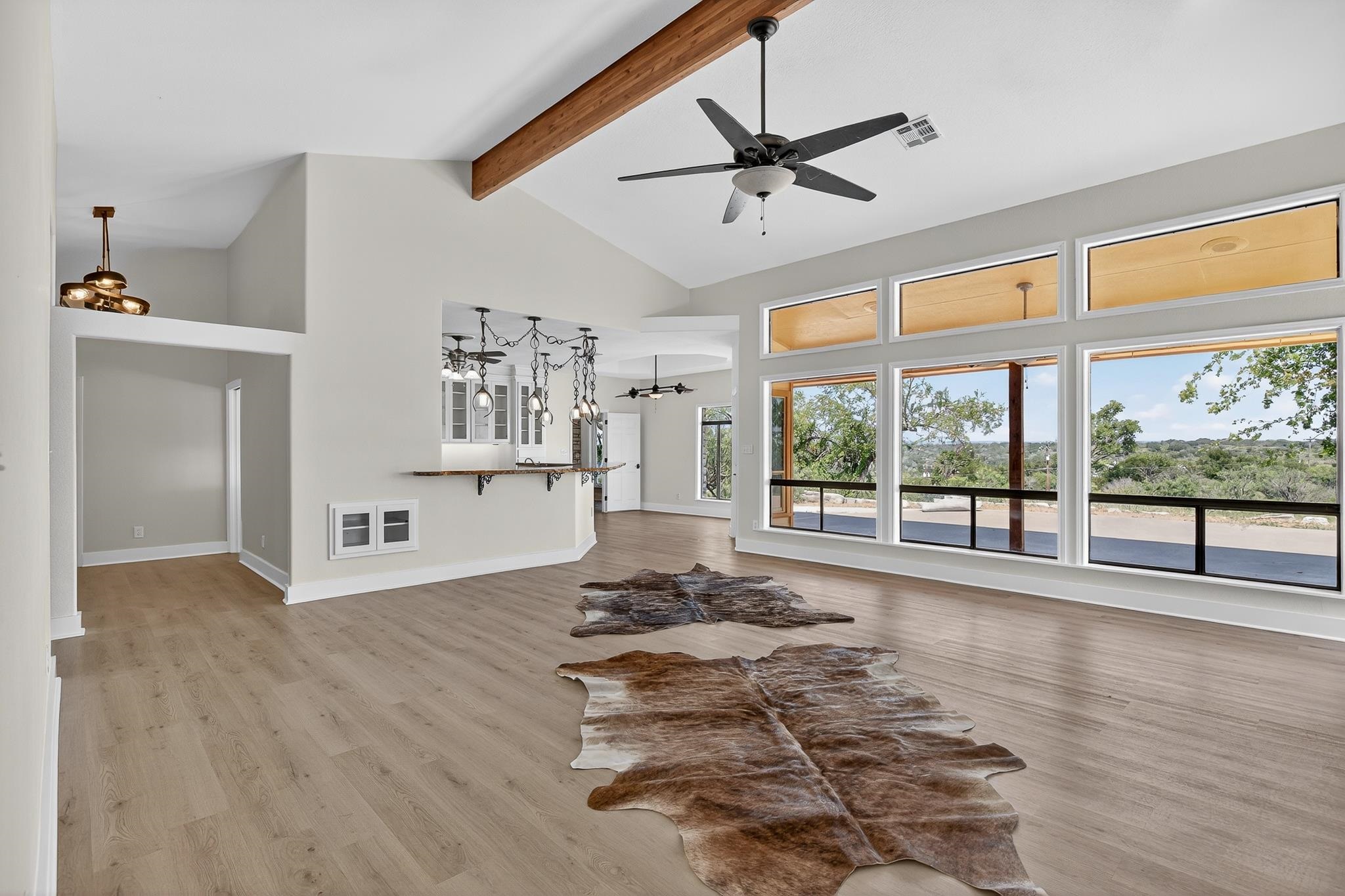 95 Gateway North Marble Falls, TX 78654 - Photo 5 of 30 a view of a livingroom with furniture ceiling fan and window