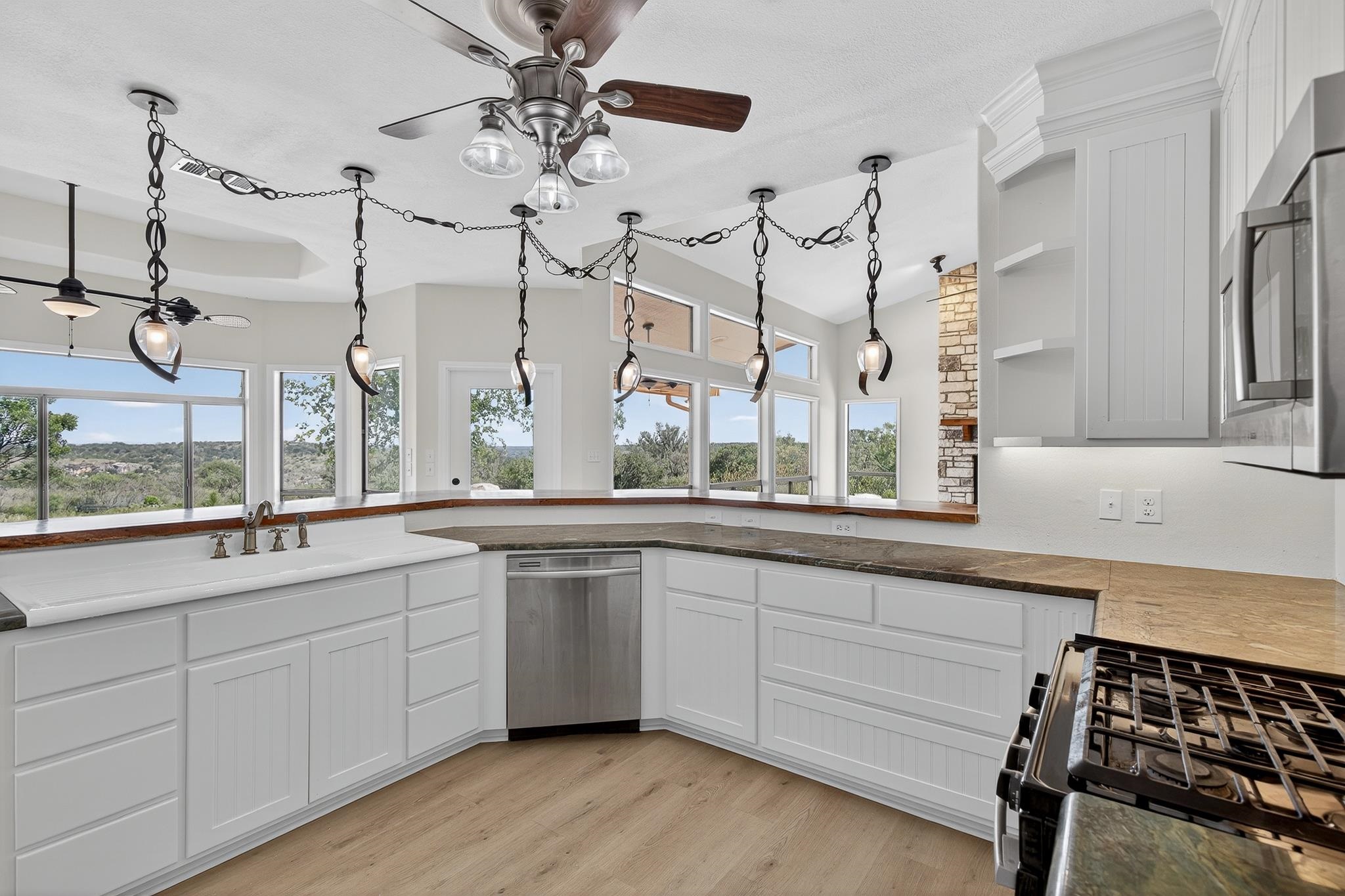 95 Gateway North Marble Falls, TX 78654 - Photo 9 of 30 a kitchen with a sink and cabinets