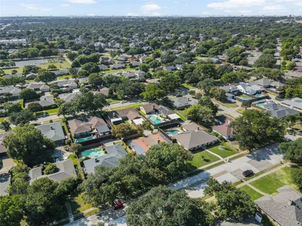 an aerial view of a city with lots of residential buildings